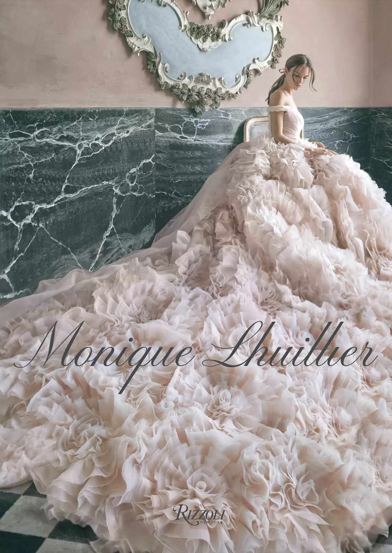 The cover of Monique Lhuilller's book, which features a model seated in a dramatic bridal gown