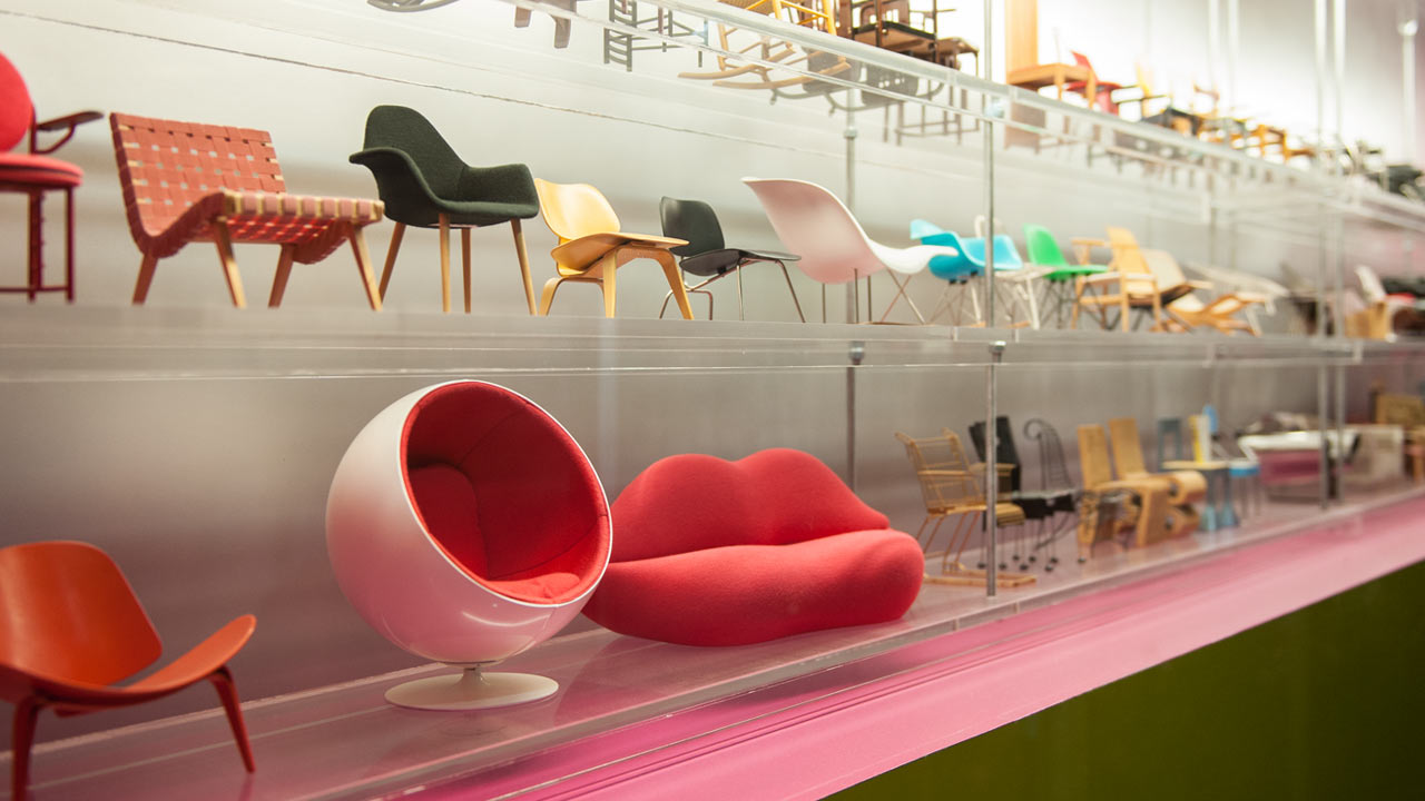 Shelves of  model chairs designed by Interior Design Students