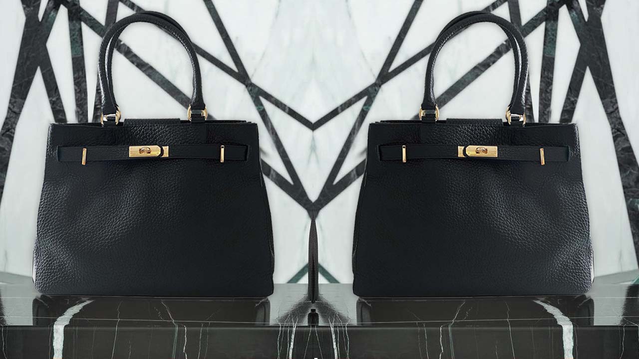 A photo of two black top handle handbags designed by FIDM Grad Eloisa Diaz