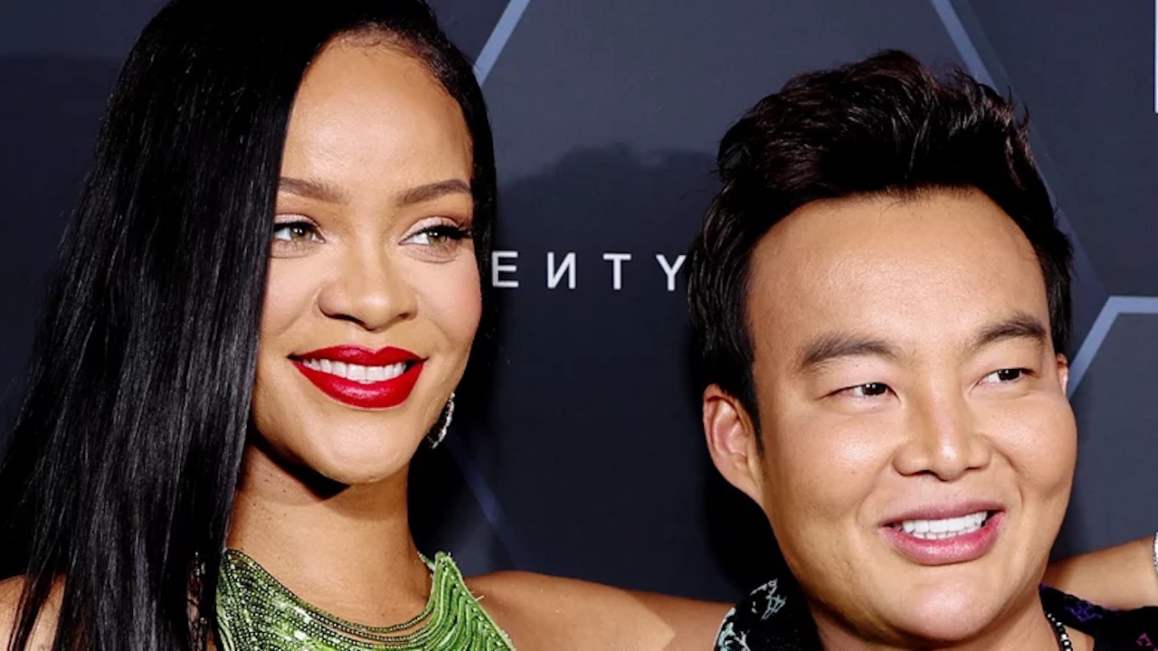 Kane Lim smiles next to Rihanna at a Fenty Beauty event