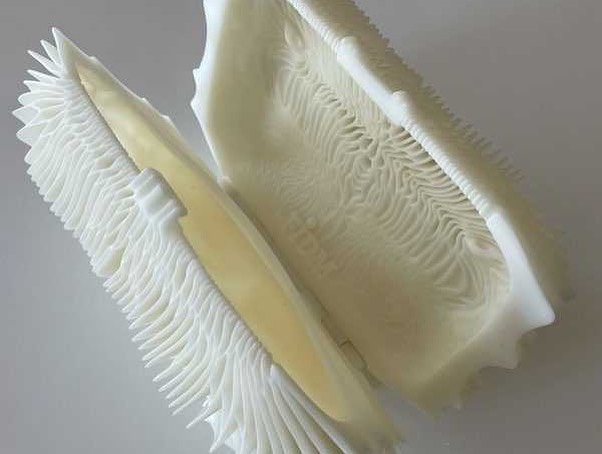 white 3-D printed HY clutch designed by Julia Koerner